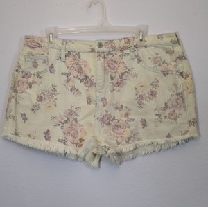 High waisted cream colored shorts with flo…